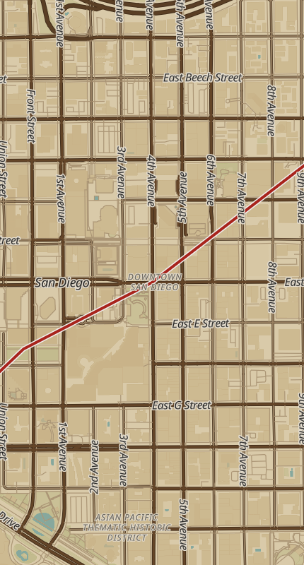Map style preview, Warm Western: the same downtown street grid in parchment and sand tones, dark brown roads and a red route line.